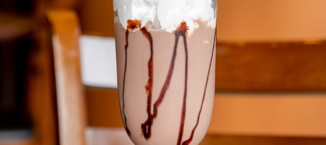 fancy choclate milk with whip the pancakery