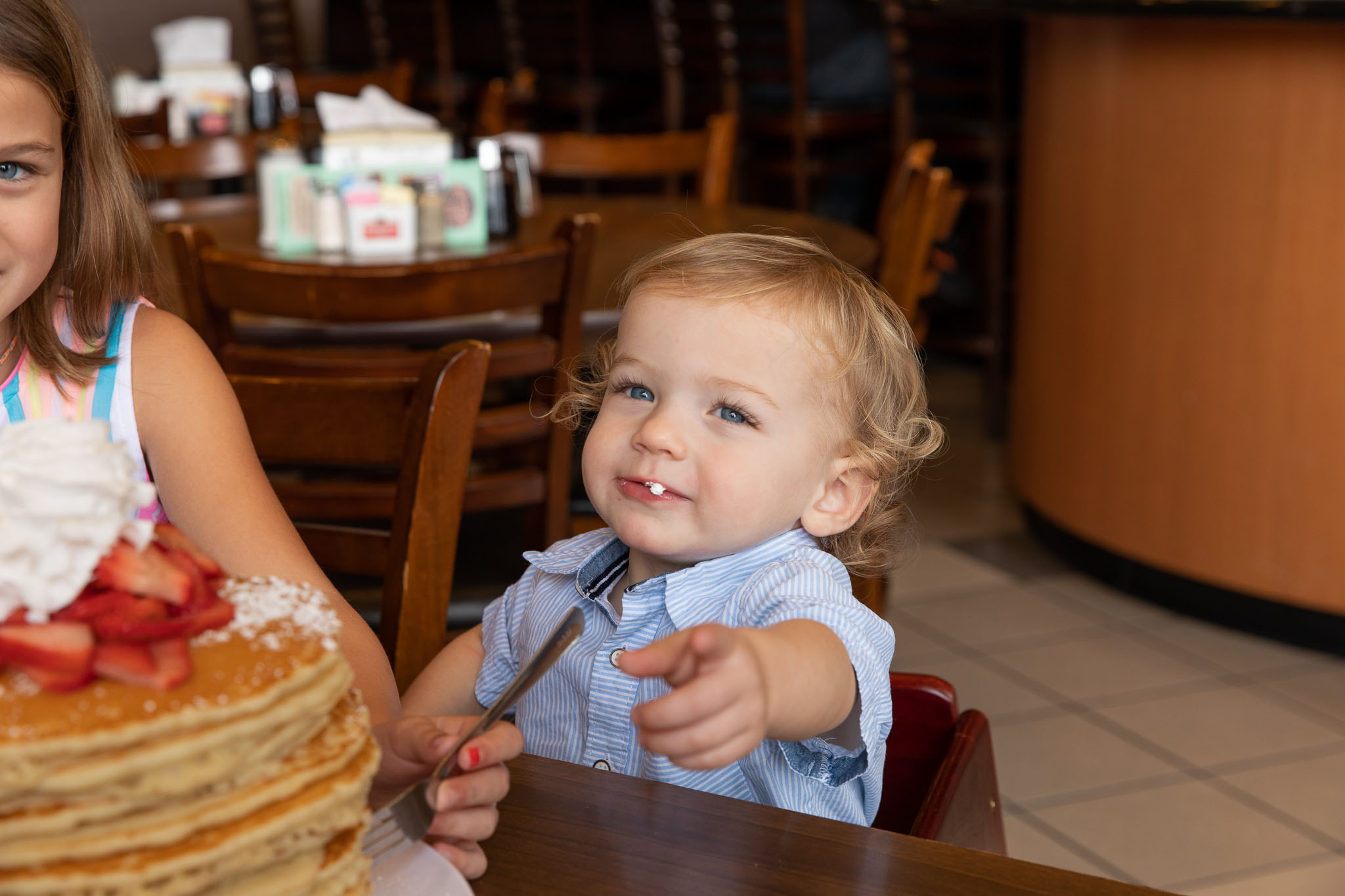 Baby enjoying pancakes