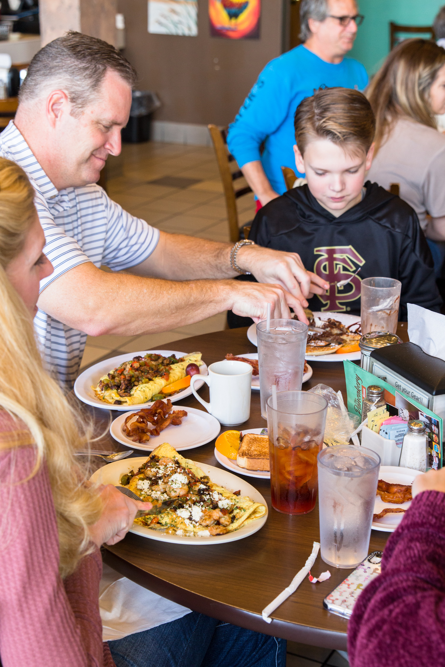 Family eating at The Pancakery restaurant
